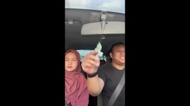 Driver pulls down entire mirror while adjusting air freshner