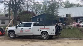 Frankfort residents on 4th and Paul Sawyer drive moved flood damaged household items to the curb while basic services are being restored.