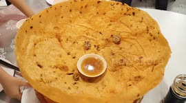 Super duper big rounded crispy snack served at Chinese restaurant in Sarawak Malaysia