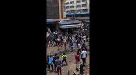 The video captures a gripping confrontation in a residential neighborhood where vigilant residents band together to thwart a group of thieves attempting a brazen robbery. Filmed on a quiet street at dusk, the footage shows three masked individuals trying 