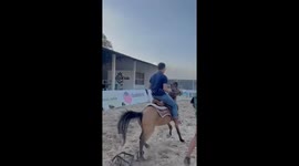 A man was carried away by a wild horse until he fell