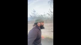 Jogger's bonnet cap caught by tree branch in Wigan, UK