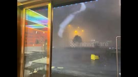 Heavy rain, wind, and hail sweep through street in Guizhou, China