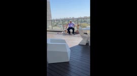 Grandpa and grandkids enjoy popsicles on the balcony