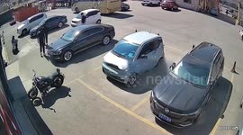 Two car reversing perfectly in sync end up in rear-end collision