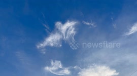 A scary ghost in the evening sky appeared to be looking down at me!