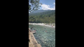 Woman's diving board fail ruins video of serene backdrop in the Philippines