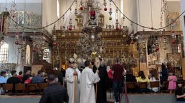 Holy Fire arrives at Church of the Nativity in West Bank city of Bethlehem amid calls for peace