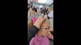 Watch this artist create a rose garden on a child’s face in seconds