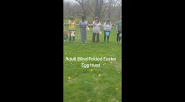 Adults fumble for eggs in hilarious Easter race
