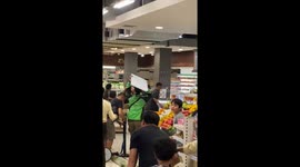 Shopper goes berserk before supermarket staff and customers subdue him
