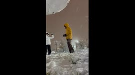 Escalating snow ball fight sees brother knocked to ground