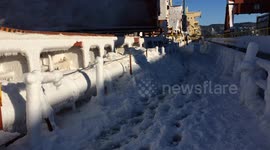Freezing spray on ship while enroute in St. Lawrence river, Canada.