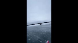 Kite surfer glides on ice in Pereslavl-Zalessky