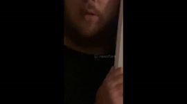 Exhausted husband falls asleep standing beside the door frame after fun night