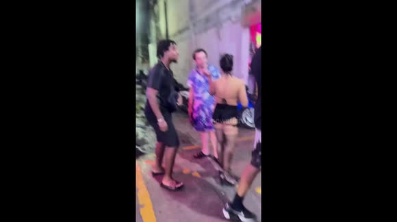Tourist ushered away by bouncers during argument with sex bar worker - Buy, Sell or Upload Video Content with Newsflare