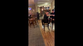 Comical footage of two brothers racing on broken chairs with an epic fail at the end