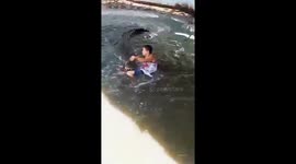 Idiotic tourist mauled by crocodile 'after climbing into enclosure to pose for selfies'