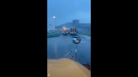 Rain lashes school buses during downpours in Ohio