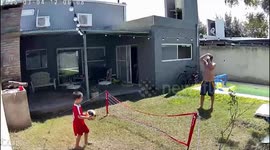 Child wins point against parent in ball game in Santa Fe