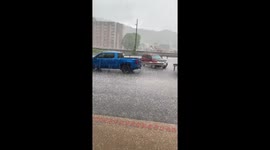Surprise hailstorm in Williamson, West Virginia- Turns city streets white in minutes