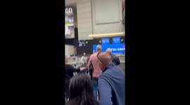 Woman shouts after being called rude for skipping queue at Venice airport