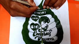Artist carves Indian cricket star portrait into leaf