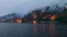Devastating Adams Lake East Fire Reaches Shoreline and encompasses the greener all around