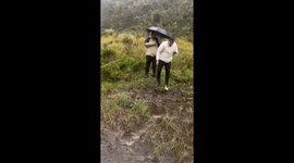 Muddy Ground Paints Two Men Brown