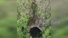 China: Young Man Rescued After Falling Into 35-Meter Pit While Fishing Alone