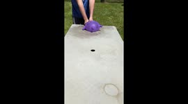 So creative! Turning a stretchy toy hand into a giant water balloon