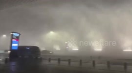Storm whips through airport in China