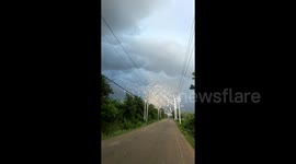 Cyclist flees in panic as tornado tears through factory in southern China