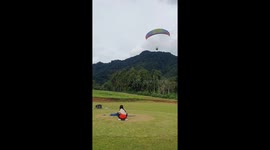 Parachutist crashes into his friends with botched landing