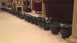 Home-made laser vs. 50 balloons - no music