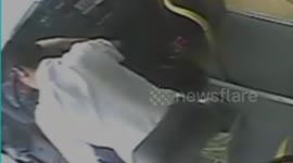 Driver manages to stop bus just before he faints