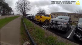 Wausau, Wisconsin Officer Gives Skittish Opossum a Safe Street Lift