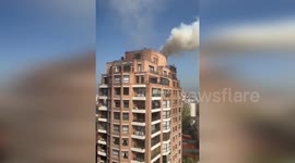 Chile: Fire On Rooftop Of 14 Floor Building In Las Condes Forces Evacuation