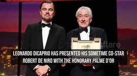 Leo DiCaprio presents Robert de Niro with Palme d'Or at Cannes