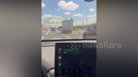 Lorry smashes into height warning sign at tunnel