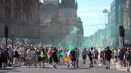 1/3 Celtic fans gathered for their traditional unofficial title party in the city centres trongate, fireworks, flares , a police helicopter with the bus shelters dismantled