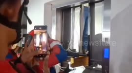 Firemen rescue five children trapped in lift in Indonesia