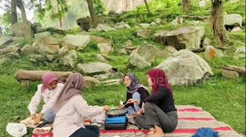 Cow disrupts picnic at Lembah Manah in Rembang, Central Java, Indonesia