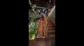 Birthday girl slides at restaurant but ends up taking a tumble at the end