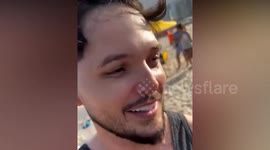British tourist rescued from hole in the sand on beach in Brazil