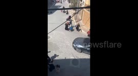 Hundreds of already displaced Palestinians are fleeing the Al-Fukhari School in Khan Younis