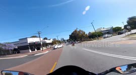 Motorcyclist Collides With Taxi