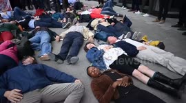 Belgium: Activists lie on ground outside EU Parliament to protest Israeli strikes on Gaza