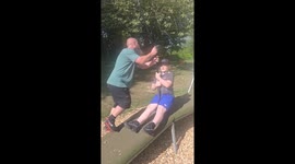 Man trips while pushing child on zipline at park in Salford, England