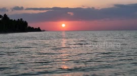The sun rises over the Gulf of Mexico near Sinanche Yucatan Mexico